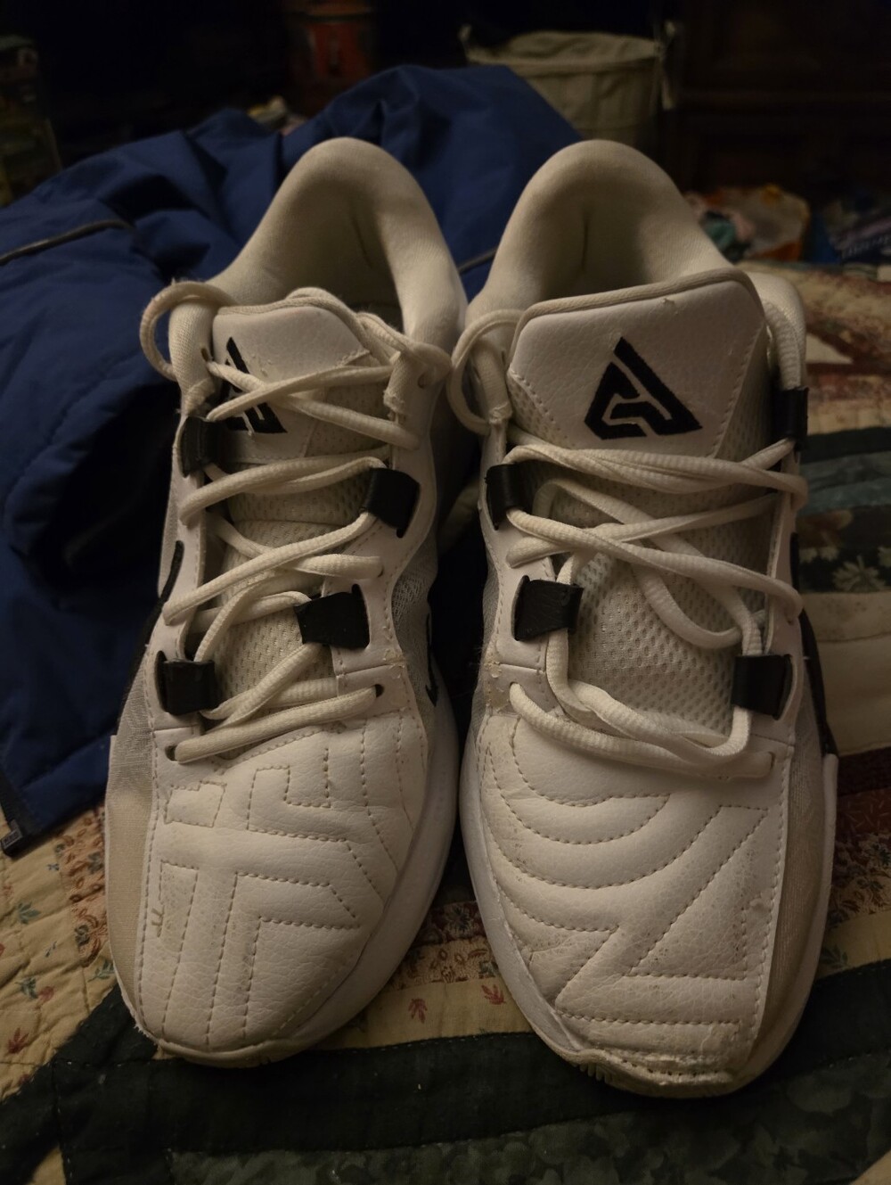 White Athletic Sneakers with Black Logo Accents